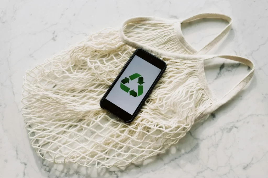 Image showing a recycling sign, representing its importance in the vape industry.