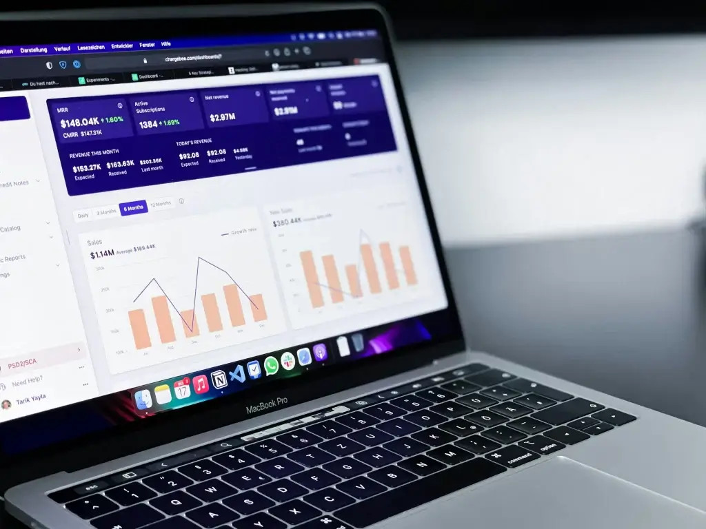 A computer showing analytics from payment processing fees.