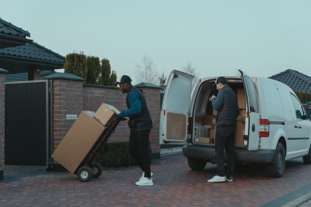 Two men delivering packages.