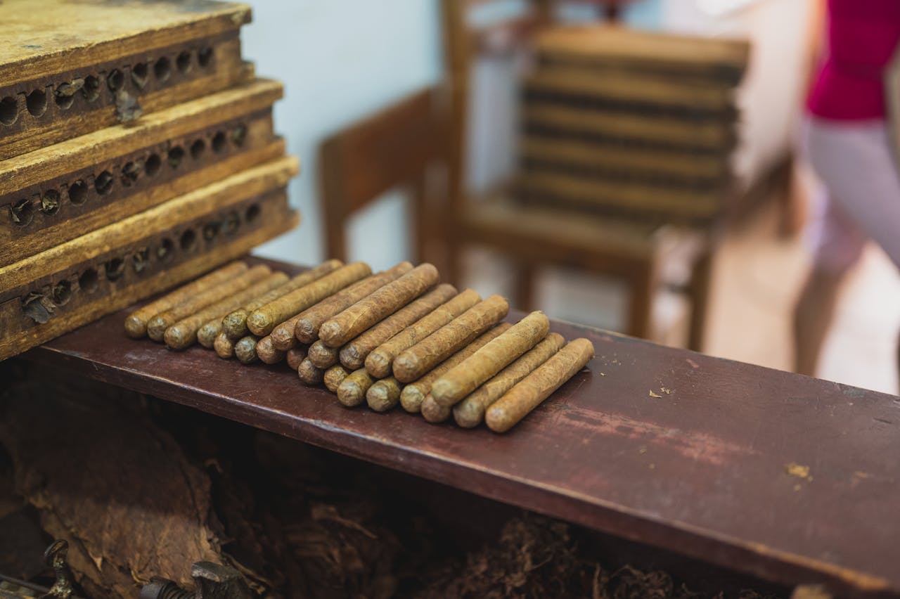 Cigars sitting on a table.